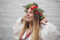 Young happy woman wearing tradisional closes and wreath Royalty Free Stock Photo