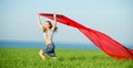 Young happy woman in wheat field with fabric. Summer lifestyle Royalty Free Stock Photo