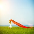 Young happy woman in wheat field with fabric. Summer lifestyle Royalty Free Stock Photo