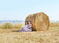 Young and happy women in a meadow of rye Royalty Free Stock Photo