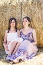 Young and happy women in a meadow of rye Royalty Free Stock Photo