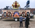 Young Hasidic boys admiring the vehicle used in a parade