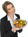 Young Healthy Business Woman Eating a Fresh Mixed Salad Royalty Free Stock Photo