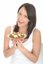 Young Healthy Happy Attractive Woman Holding a Plate of Fresh Salmon Salad Royalty Free Stock Photo