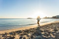 Young healthy lifestyle fitness woman running at sunrise beach Royalty Free Stock Photo