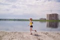 Young healthy lifestyle woman running at sunrise beach. Royalty Free Stock Photo