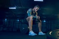 Young healthy man athlete preparing for training in the gym Royalty Free Stock Photo