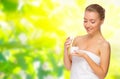 Young healthy woman with body cream Royalty Free Stock Photo