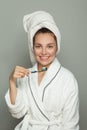 Young healthy woman brushing her teeth, morning routine Royalty Free Stock Photo