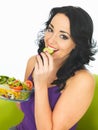 Young Healthy Woman Eating a Fresh Crisp Mixed Garden Salad