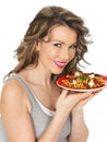 Young Healthy Woman Eating Holding a Pasta Salad Royalty Free Stock Photo
