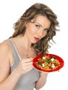 Young Healthy Woman Eating a Pasta Salad Royalty Free Stock Photo