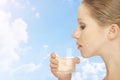 Young healthy woman and a glass of clean water Royalty Free Stock Photo