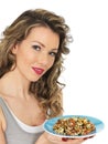 Young Healthy Woman Holding Eating a Mixed Bean Salad Royalty Free Stock Photo