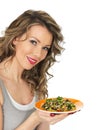 Young Healthy Woman Holding Plate of Mixed Bean and Wild Rice Salad Royalty Free Stock Photo