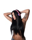 Young heavily tattooed woman Listening to colorful DJ Style Head