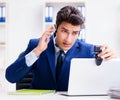 Young help desk operator working in office Royalty Free Stock Photo