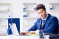 The young help desk operator working in office Royalty Free Stock Photo