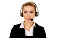 Young helpline operator in headset