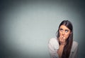 Young hesitant nervous woman biting fingernails craving or anxious Royalty Free Stock Photo