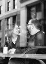 A young heterosexual couple enjoying a conversation at a nyc coffee shop Royalty Free Stock Photo