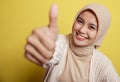 young hijab women happy and show the thumb up