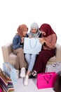 Young hijab women surprised open their shopping bag