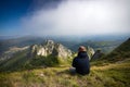 Young hiker backpacker in romanian Ciucas mountains