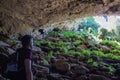 Young hiker inside the cave Royalty Free Stock Photo