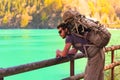 Young Hiker looking at a mountain lake Royalty Free Stock Photo