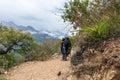 Young hiker man trekking with backpack in Peruvian Andes mountains, Peru, South America Royalty Free Stock Photo