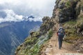 Young hiker man trekking with backpack in Peruvian Andes mountains, Peru, South America Royalty Free Stock Photo