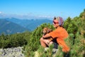 Young hiker with a small dog Royalty Free Stock Photo