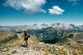 Young hiker standing at the edge of a hill in the French Riviera backcountry