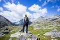 Young hiker woman in Vall de Boi, Aiguestortes and Sant Maurici National Park, Spain