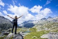 Young hiker woman in Vall de Boi, Aiguestortes and Sant Maurici National Park, Spain