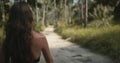 Young hiker woman walking jungle forest trail Royalty Free Stock Photo