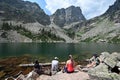Young hikers enjoy Emerald Lake in Rocky Mountain National Park, Colorado Royalty Free Stock Photo