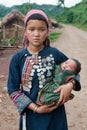 Young hill tribe mother with baby
