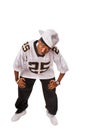 Young hip-hop dancer standing on white Royalty Free Stock Photo