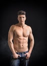 Young hip man in jeans, shirtless, isolated on Royalty Free Stock Photo