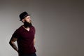 Young hipster bearded man wearing hat