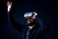 Young hipster bearded man wearing virtual reality goggles. Royalty Free Stock Photo