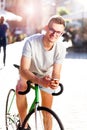 Hipster Boy Sitting On Green Bicycle