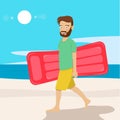 Young hipster man with air mattress walking along the beach