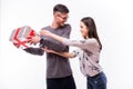 Young hipster Man hide a Gift on holiday his girlfriend. Royalty Free Stock Photo