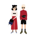 Young hipster man and woman wearing trendy outfits. Male and female cartoon characters dressed in modern fashionable Royalty Free Stock Photo