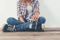 Young hipster photographer hand holding retro camera sitting on Royalty Free Stock Photo