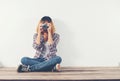 Young hipster photographer woman taking photo and look at camera Royalty Free Stock Photo