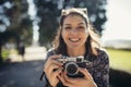 Young hipster tourist street photographer visiting colourful Lisbon.Enjoying colourful and busy city life